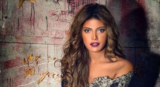 ريهام حجاج تغازل زوجها بعد إنقاذه ألف أسرة