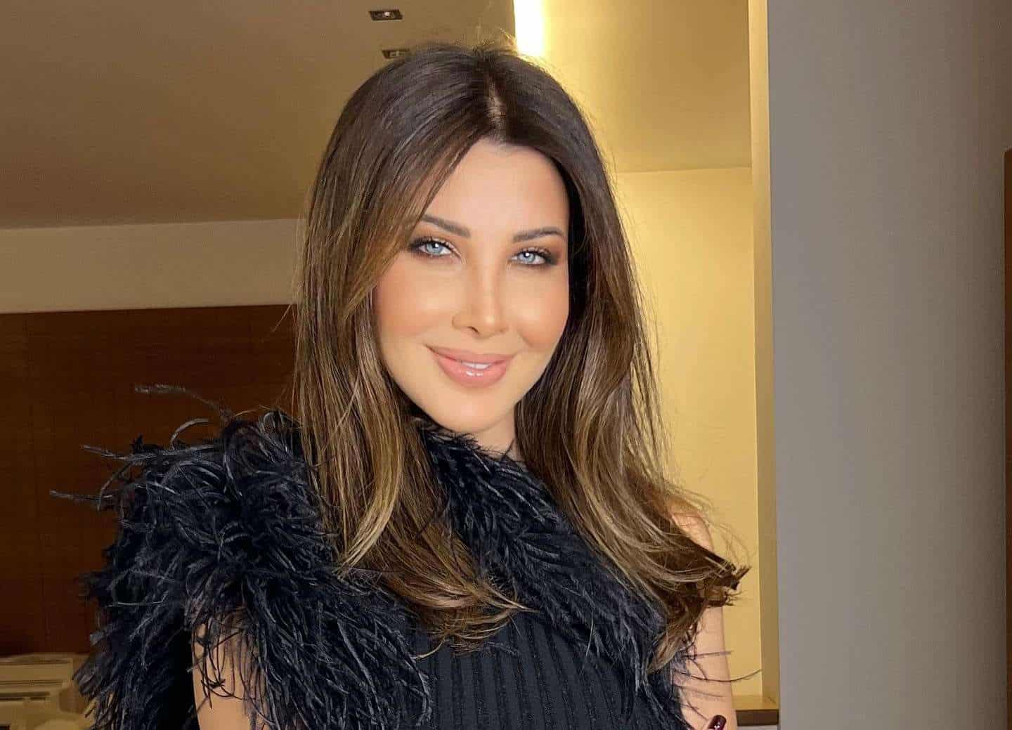 نانسي عجرم في حفل ليلة نجمات العرب بـ3 إطلالات.. أيهما الأجمل؟