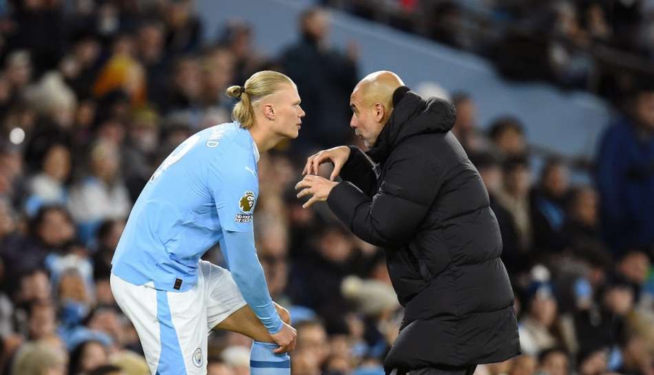 جوارديولا مع هالاند في مانشستر سيتي