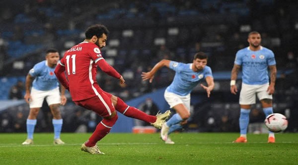 تعادل مثير بين ليفربول ومانشستر سيتي لصالح أرسنال في الدوري الإنجليزي